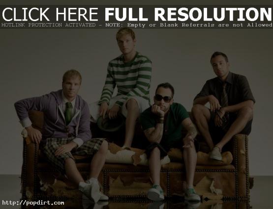 Brian Littrell, Nick Carter, AJ McLean and Howie Dorough of the Backstreet Boys on a couch