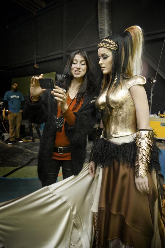 Katy Perry in a custom gold bust for the 'E.T.' music video