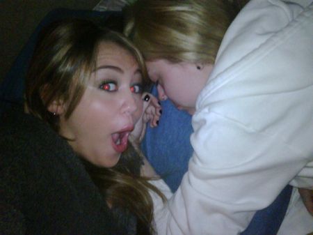 Miley Cyrus photographs sleeping sister Brandi again