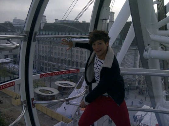 Louis Tomlinson of One Direction, seen here at London Eye, talks with KiSS 92.5 in Toronto about not being suited for tattoos having music for everyone on 'Take Me Home', working with Ed Sheeran on the album, loving to work with Katy Perry in the future, the variation in their fan base and getting a treehouse.