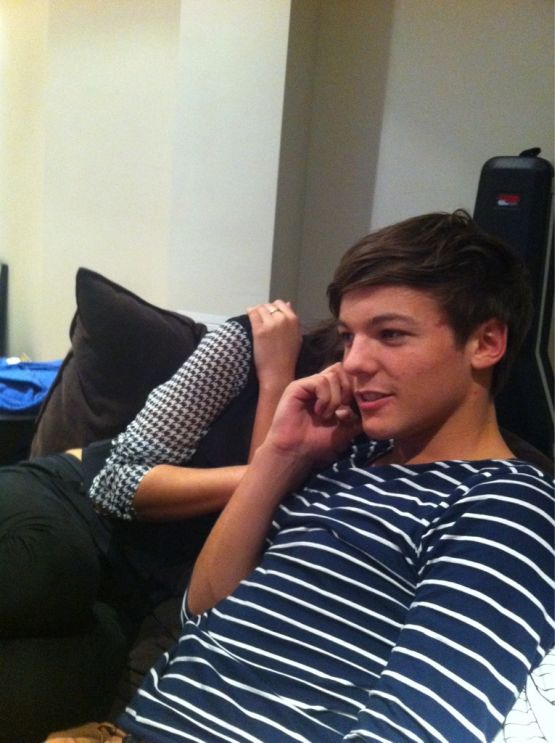 Louis Tomlinson of One Direction on the phone with the Radio 1 Breakfast Show, where the 1D member talked about never getting used to the screaming female fans, excitement for the new songs, being a fan of Busted growing up, and how he gets really nervous performing and talking in front of many people