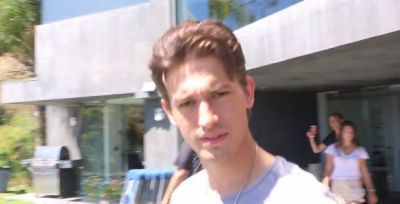 Asher Monroe outside on the set of his 'Here With You' music video shoot