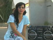 Katy Perry with a boombox during the 'Hot N Cold' video behind the scenes