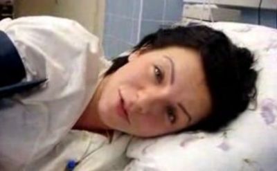 Yulia Volkova, seen here at the hospital without makeup, talks about giving birth to a baby boy