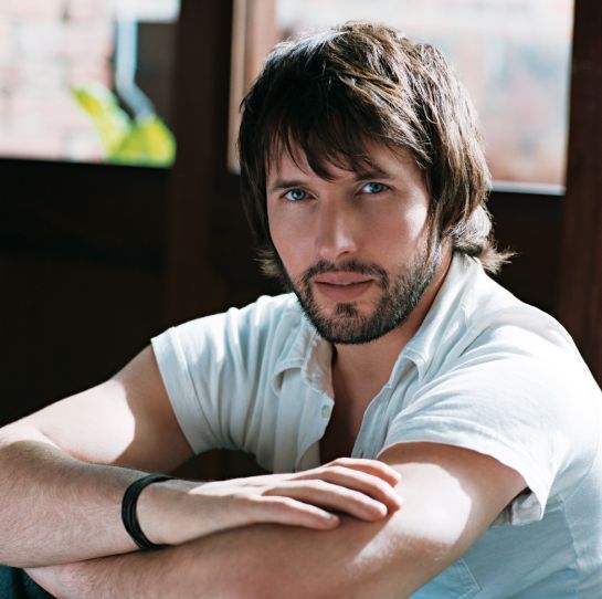 James Blunt sitting