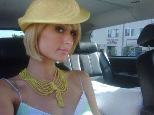 Paris Hilton shows off her vintage jewelry & new hat