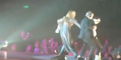 Miley Cyrus attacked on stage in Melbourne by fan who rushed the stage